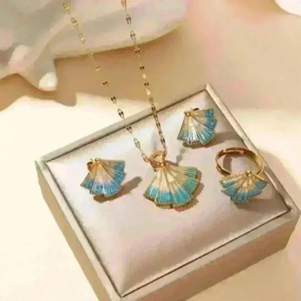 Delicate Fan-Shaped Pendant Accented with Shimmering Blue Hues